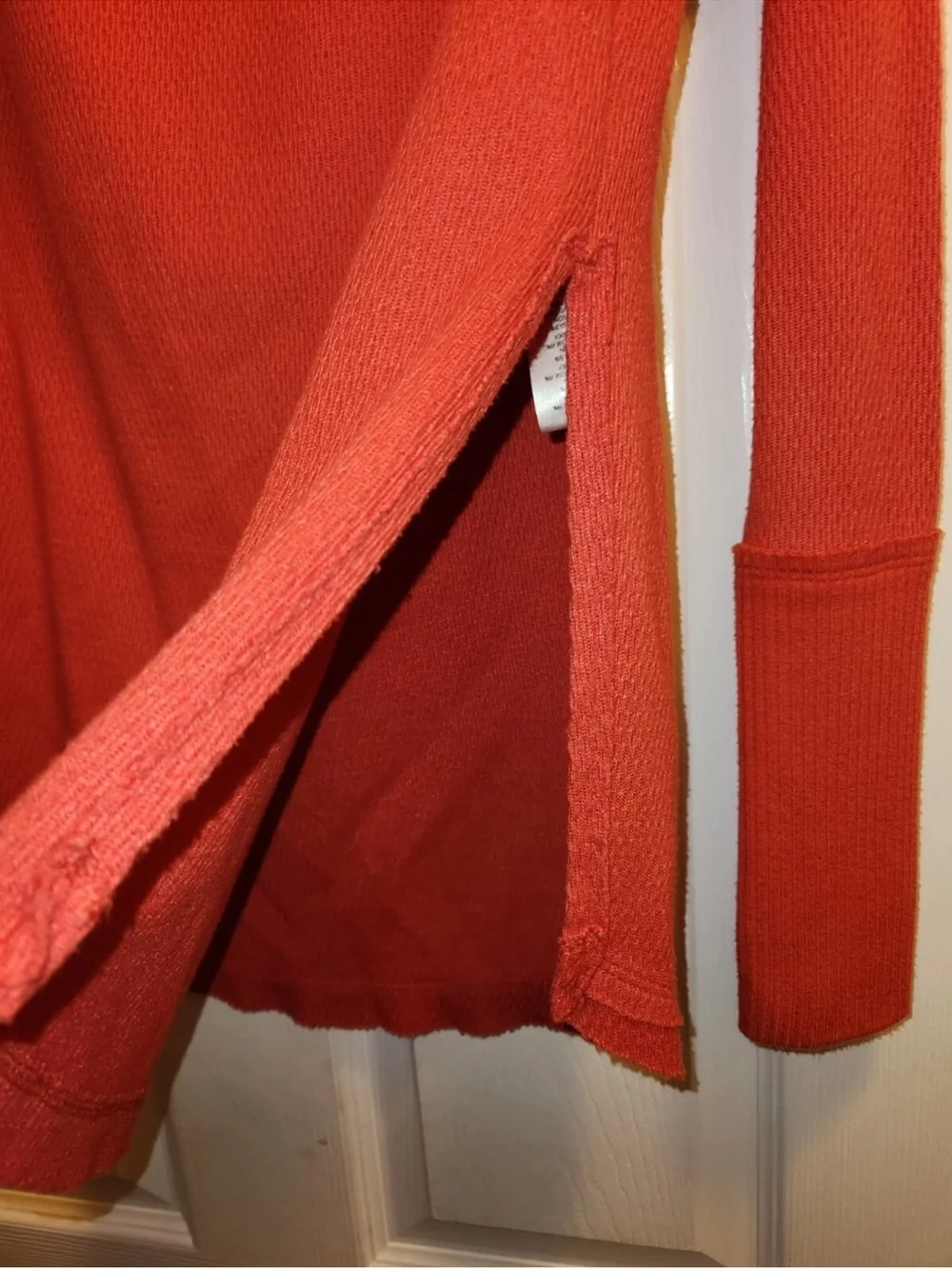 This is a Free People We The Free red thermal top
